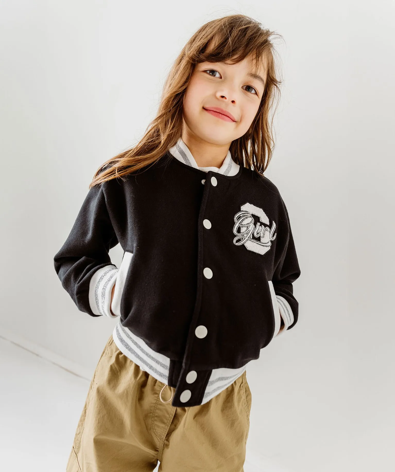 Blouson en molleton et fermeture pressionnée fille noir