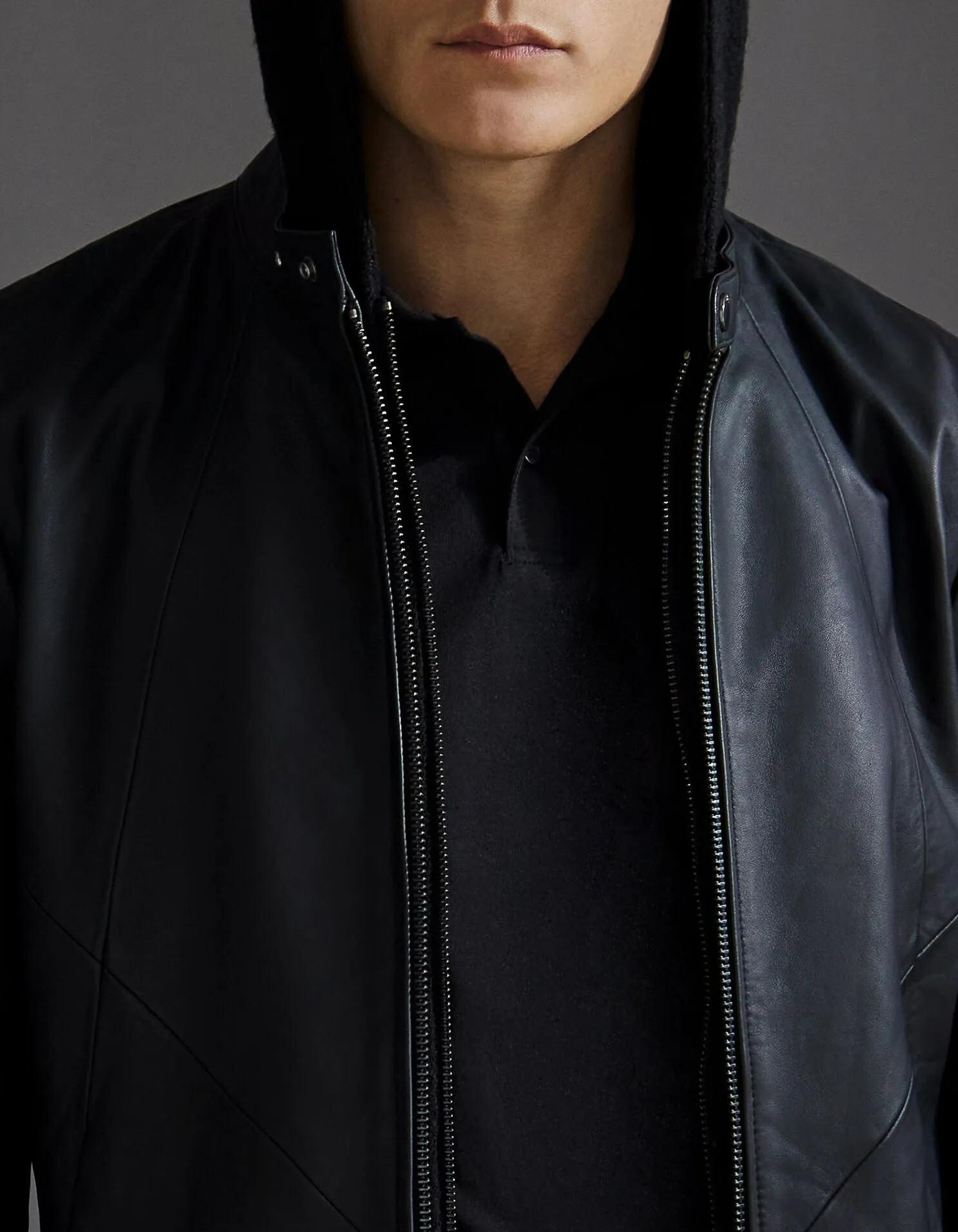 Blouson noir en cuir avec découpes Homme