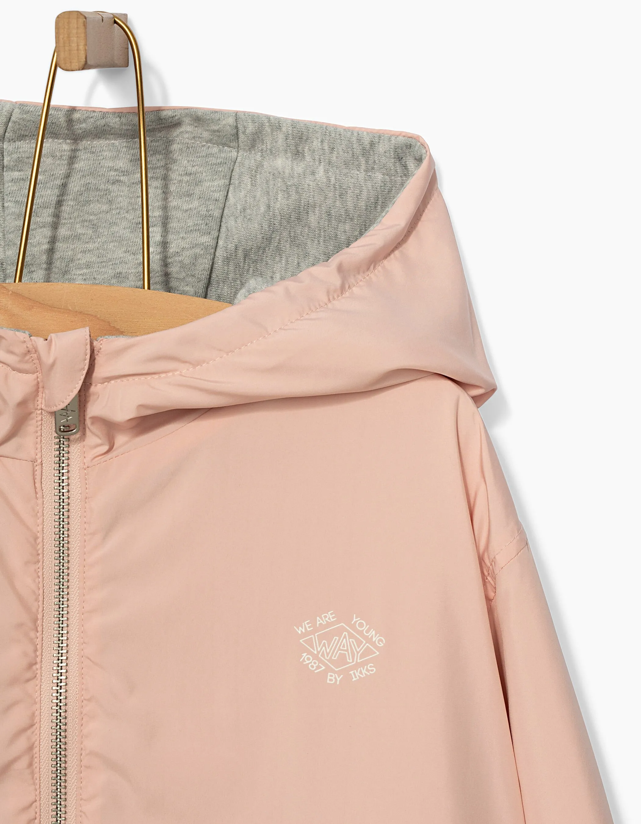 Blouson réversible rose pastel et gris fille